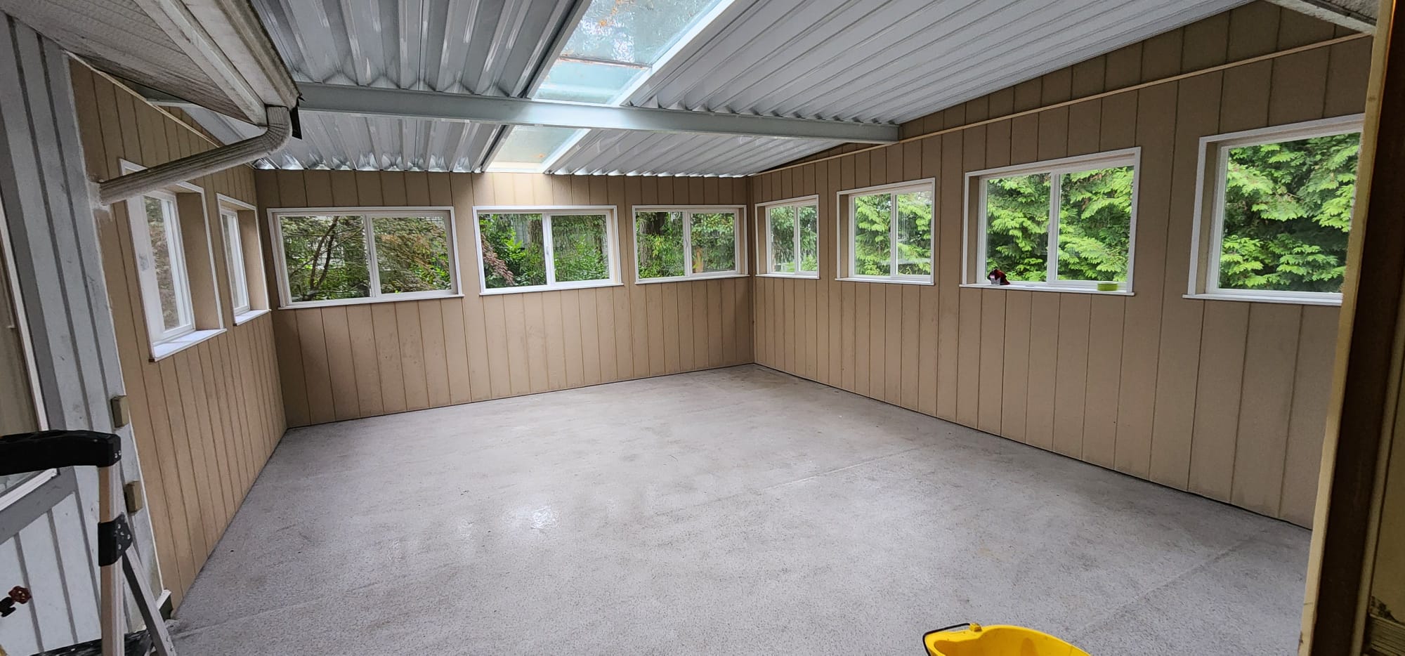 Deck after patio cover addition — enclosed sunroom